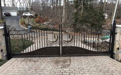 Custom Driveway Gate with Cast Balusters and Personalized Family Medallion