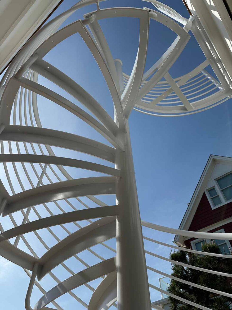 Custom Spiral Staircase with Curved Horizontal Line Railing | Newman ...
